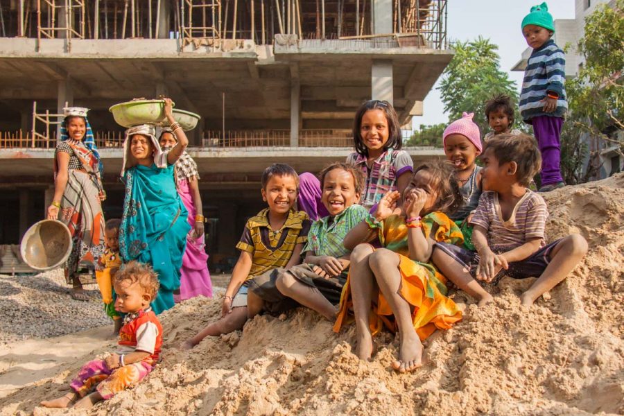 Indian female construction workers and their children