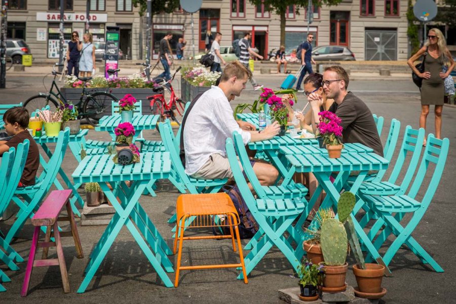 People sitting in Copenhagen street cafe