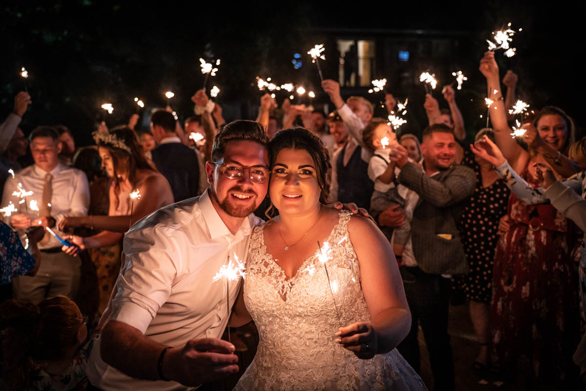 Mark and Chelsea sparklers at Oaklands Hotel